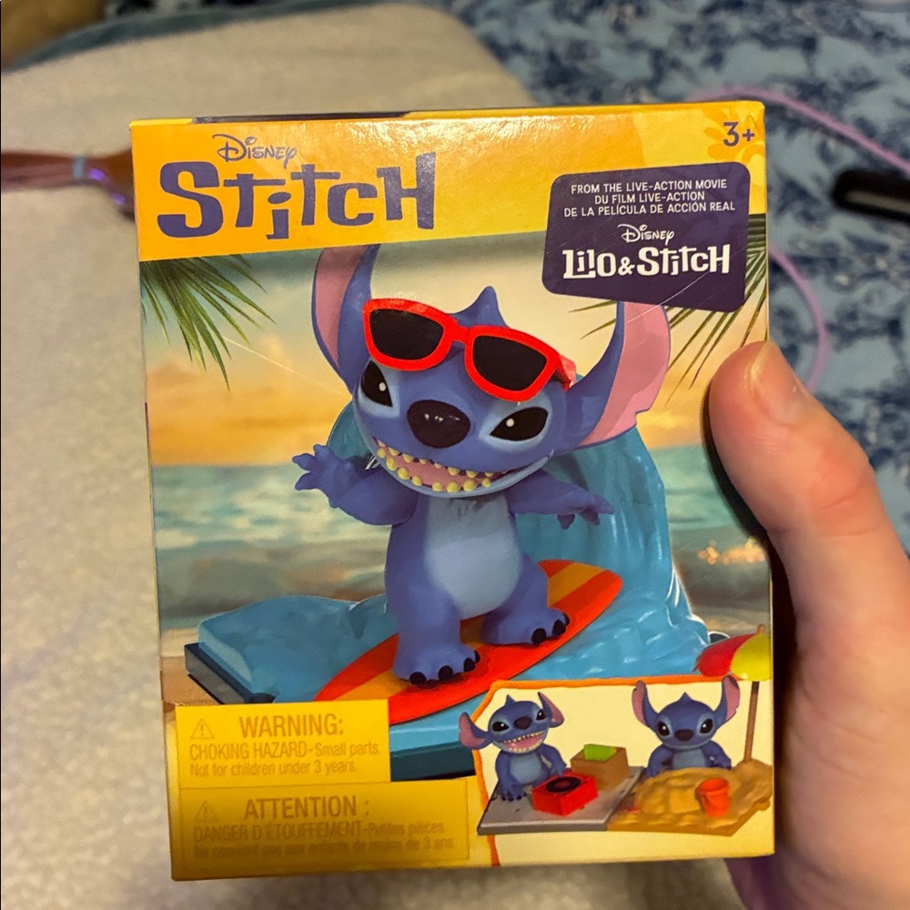 Disney Stitch Surfing Figurine with Red Accents
